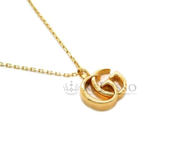 Collana Gucci GG Running in oro giallo. Pendente 22mm. foto10